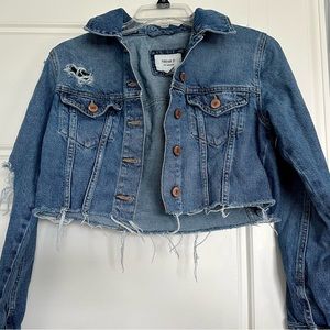 Distressed denim jacket